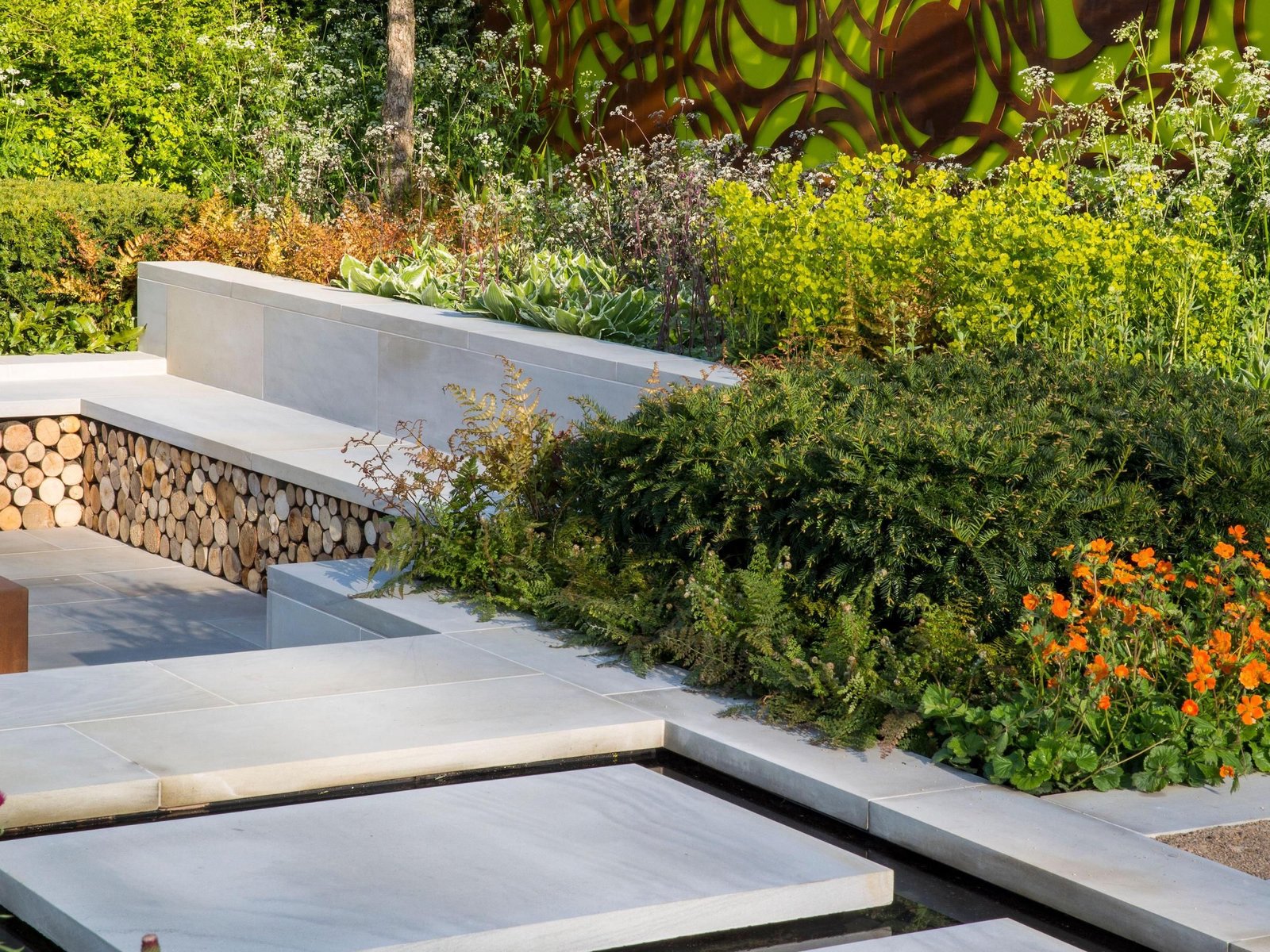 Luxury sunken garden with seating areas